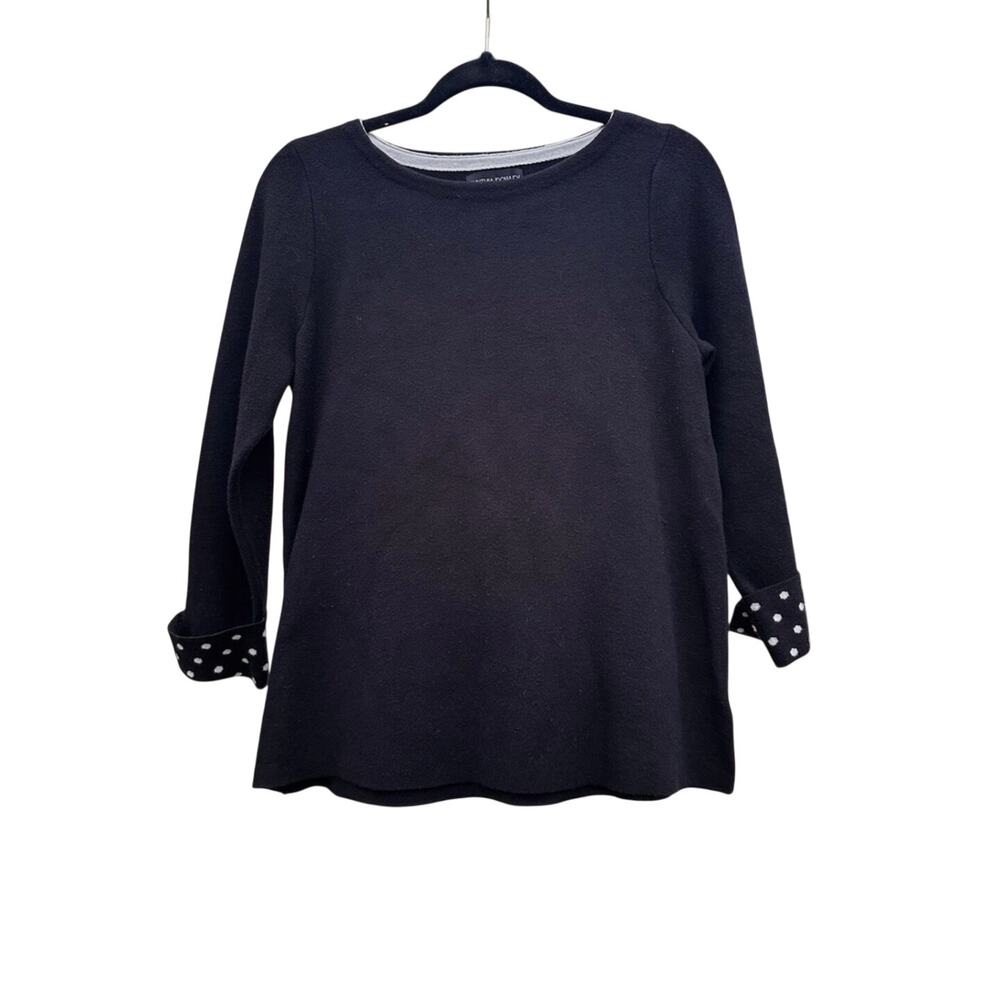 Cynthia Rowley black pullover sweater with polka dot cuffs.